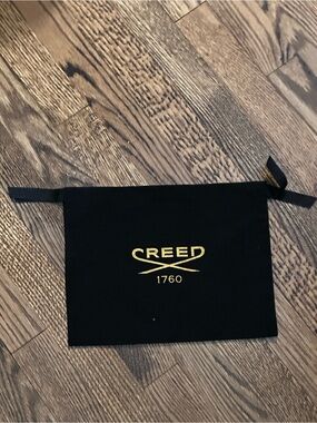 Creed Black Drawstring Pouch with Gold Logo